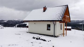 Фото номера Дом с 2 спальнями Дома для отпуска Domek do wynajęcia SkoSki г. Явожинка 27